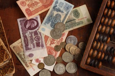 Soviet rubles from the time of the Union of Soviet Socialist Republics and old abacus clipart