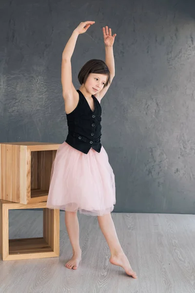 Girl dreams of being a ballerina.She trains hard every day. Future ballerina — Stock Photo, Image