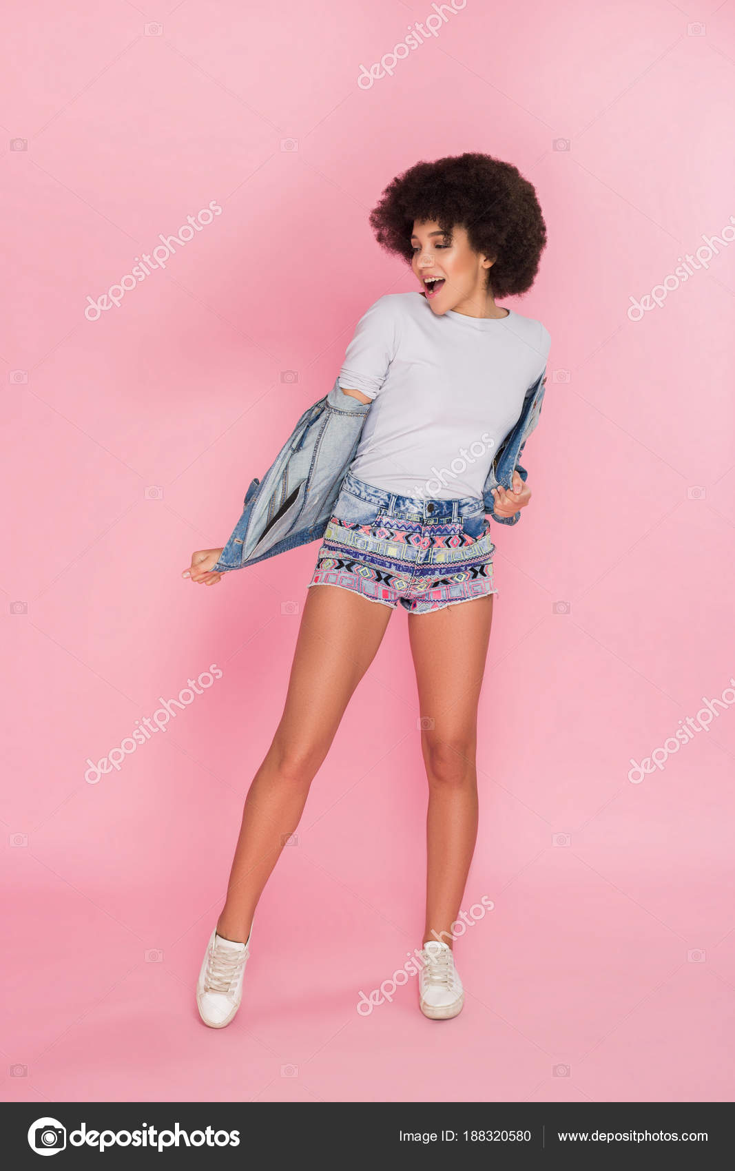 Clothing is a form of self-expression! Smart good-looking stylish young woman, while wearing 