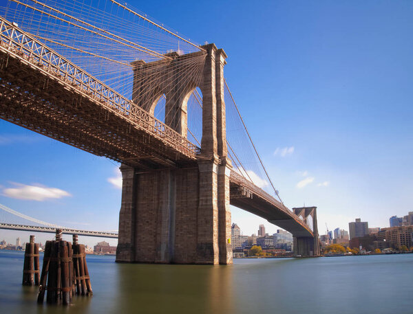 Long exposure shot of the iconic Brooklyn Bridge, New York City