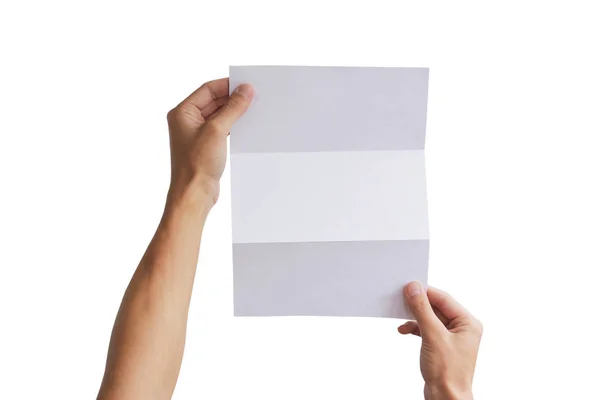 Mão segurando brochura em branco livreto na mão. Folheto presente — Fotografia de Stock