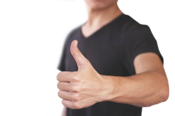 Young man in black t shirt shows thumb up. Isolated on white bac — Stock Photo, Image