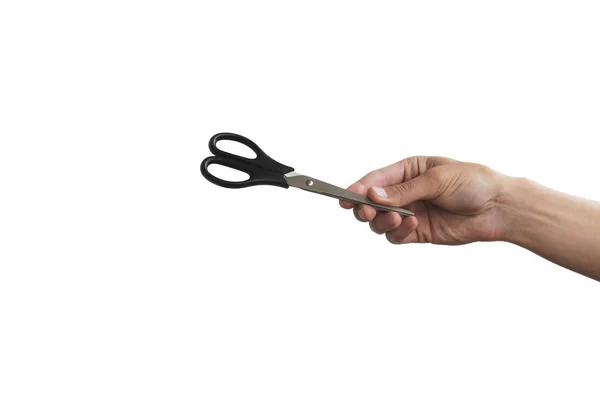 Scissors in hand. Isolated on grey background — Stock Photo, Image