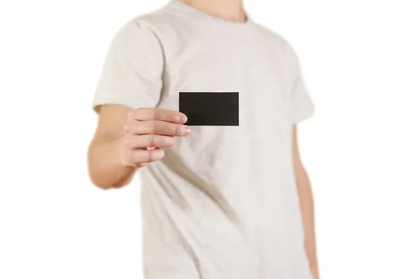 Hombre mostrando tarjeta negra. Presentación del folleto. Folleto cogido de la mano —  Fotos de Stock