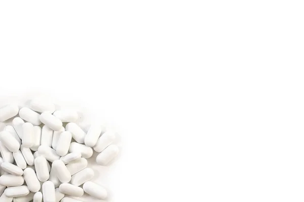 Pills spilling out of pill bottle on white — Stock Photo, Image