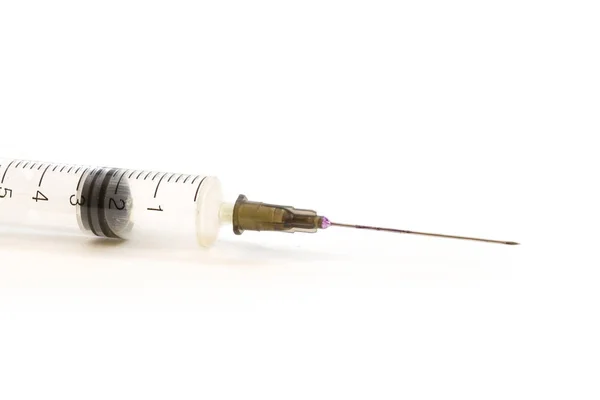 Medical syringe on white background Stock Image
