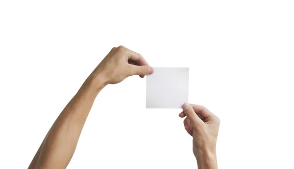 Дві руки тримають квадратний папір у руці. Презентація листівки . — стокове фото