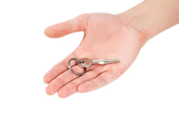 Schlüssel in der Hand. isoliert auf weißem Hintergrund. — Stockfoto