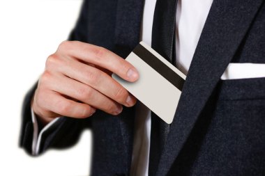Akıllıca bir kredi kartı onun bozuğu koyarak iş adamı giyinmiş