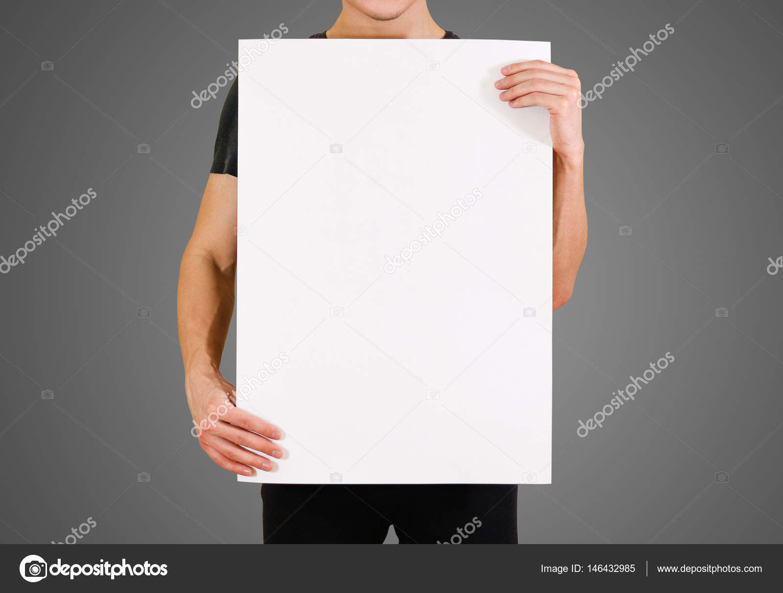 Man showing blank white big A2 paper. Leaflet presentation. Pamp