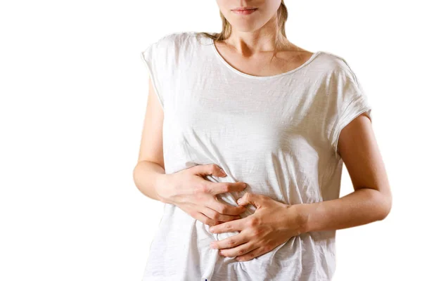 Beautiful woman in white t-shirt having her period. Brunette gir — Stock Photo, Image