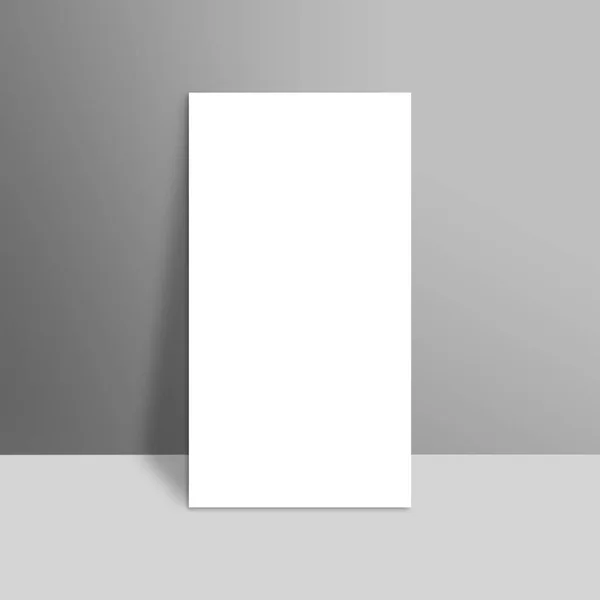 White blank stationary near the grey wall with shadow. Close up — Stock Photo, Image