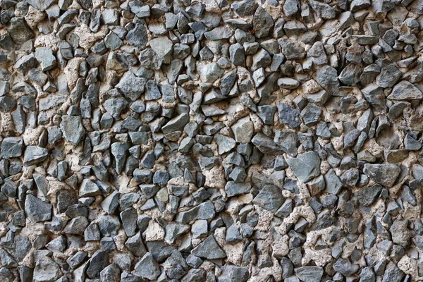 Textury betonová stěna s kameny. Closeup — Stock fotografie
