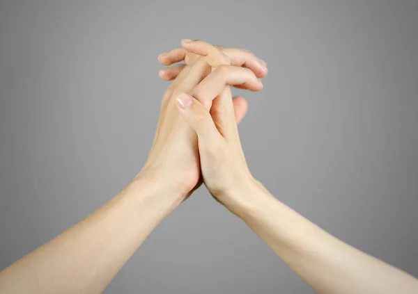Male hand holding female hand. Isolated — Stock Photo, Image