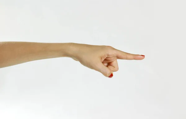 La mano femenina muestra la dirección. Aislado sobre fondo gris. Cl —  Fotos de Stock