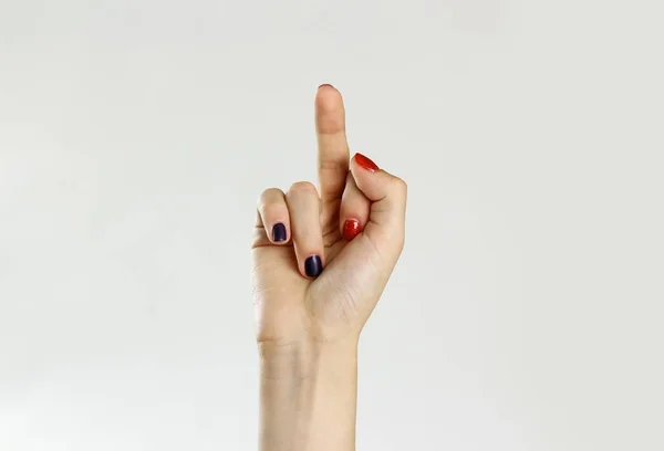 Female hand shows middle finger. Isolated on gray background. Cl — Stock Photo, Image