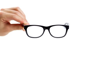 El görüş düzeltilmesi için şeffaf gözlük tutar. İzole