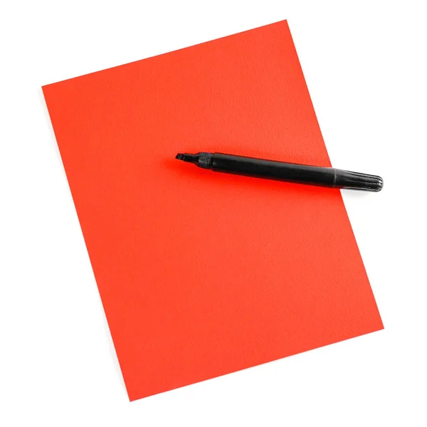 Black marker on red paper on a white background. Closeup — Stock Photo, Image
