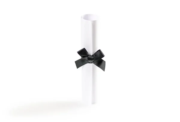 Bläddra i vitt papper med en svart rosett på en vit bakgrund. Cl — Stockfoto