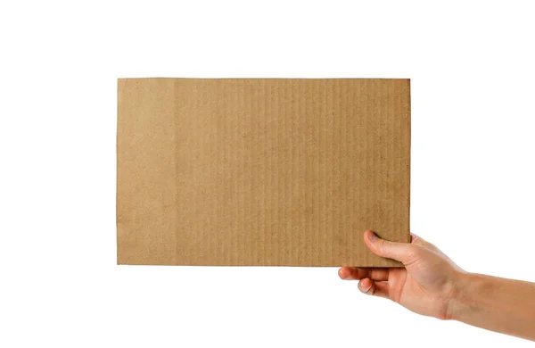 Hands holding a piece of cardboard. Isolated on a white backgrou — Stock Photo, Image