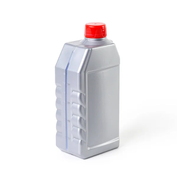 Zilverkleurige fles met rode deksel te meten. Remvloeistof — Stockfoto