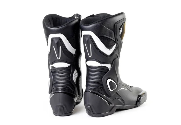 Black and white sports motorcycle boots. Isolated on a white bac — Stock Photo, Image