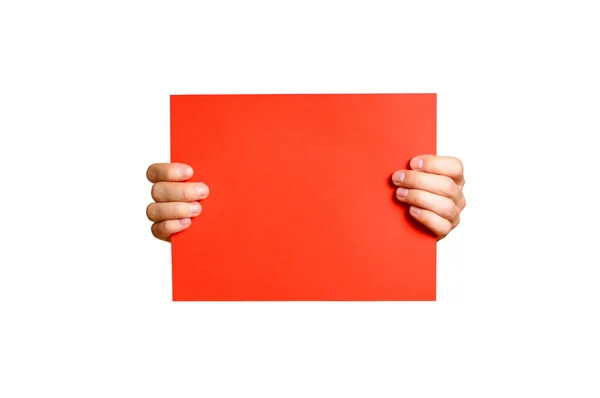 Hands holding a red clean blank sheet of A4. Isolated on white b — Stock Photo, Image