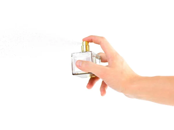 De hand met de Keulen. Sprays parfum. Geïsoleerd op een whit — Stockfoto