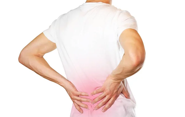 En man håller tillbaka. Smärta i nedre ryggen. Andros. Öm punkt i rött. Närbild. Isolerad på vit. — Stockfoto