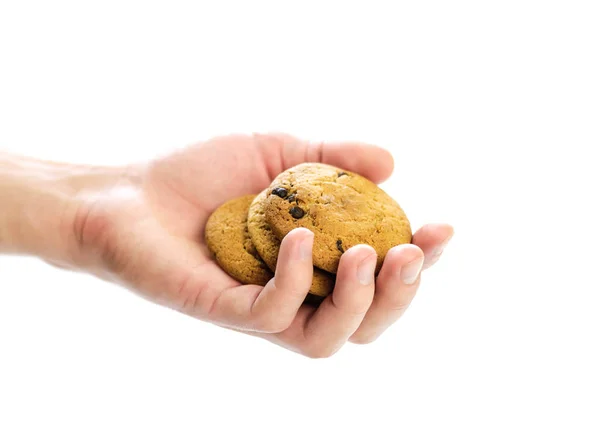 Hand hält Haferflockenkekse mit Schokoladenchips. Nahaufnahme. iso — Stockfoto