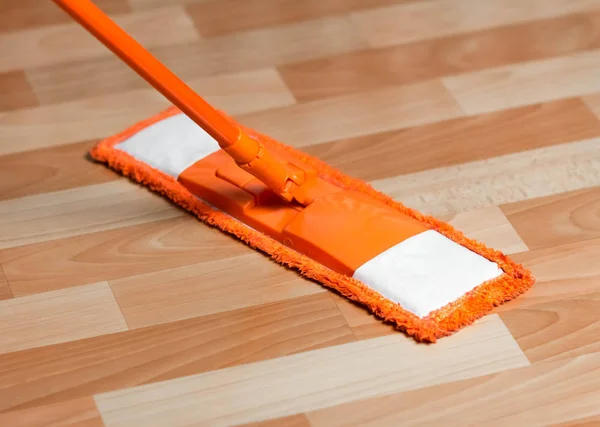 Naranja MOP en el suelo. De cerca. — Foto de Stock