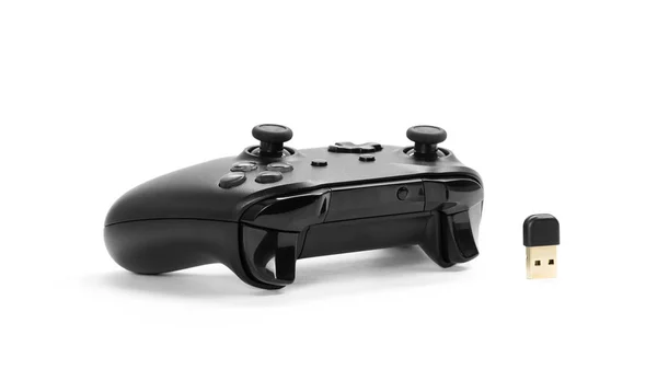 Black gamepad for playing computer games. Gamepad and receiver f — Stock Photo, Image