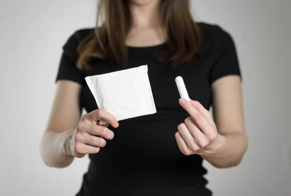 Girl Holds White Pad Tampon Close Isolated Gray Background — Stock Photo, Image