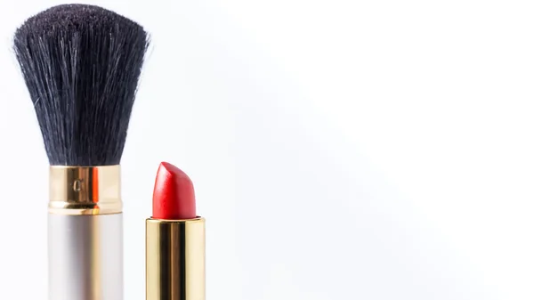 Make up brush with red lipstick on white background. — Stock Photo, Image