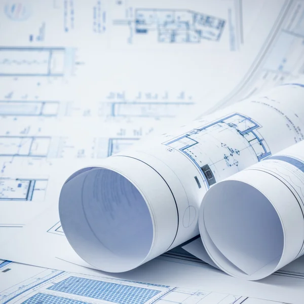 Rolled and flat architectual plans Stock Picture