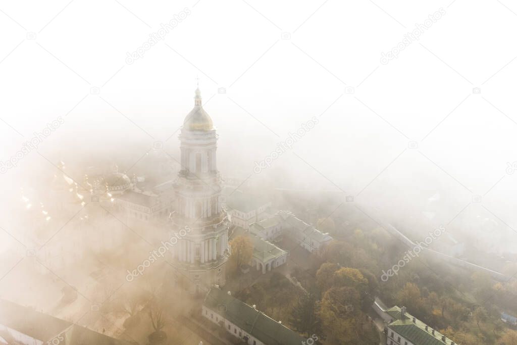 Beautiful, foggy, morning, autumn top view of the Kiev Pechersk Lavra. Kiev.