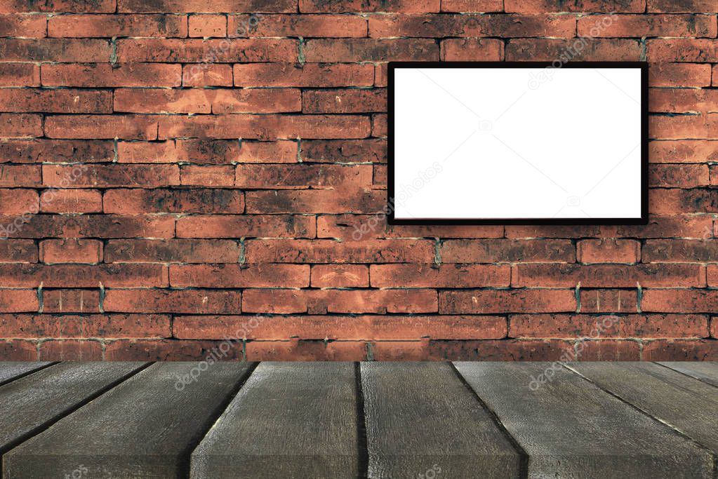 black frames on old brick wall with black wooden perspective for
