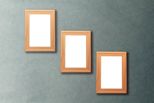 Group of blank wood picture frame on the old vintage wall with c — Stock Photo, Image