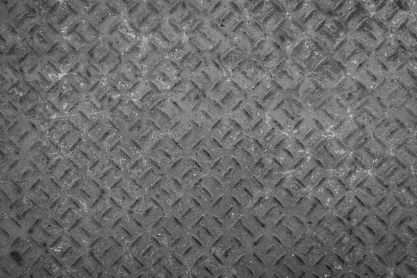 Placa de piso de metal viejo con patrón de diamante y fondo oxidado — Foto de Stock