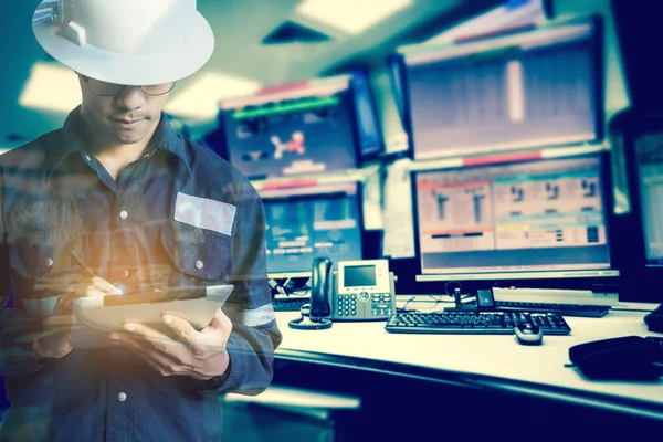 Double exposure of  Engineer or Technician man in working shirt