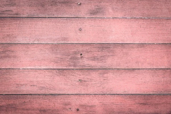Tic zvětralé stodola staré růžové dřevo pozadí s uzly a nehtů — Stock fotografie