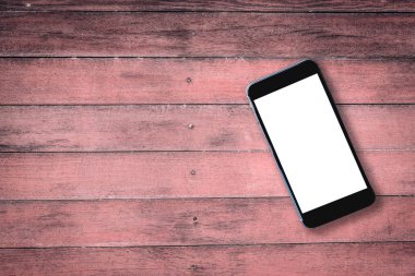 eski ahşap masa boş akıllı telefon üstten görünüm görüntüsü. hazır 
