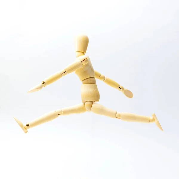 Wooden figure doll with jumping emotion for success business con