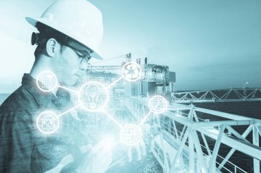 Mühendis veya teknisyen adamın sanayi aracıyla çift pozlama