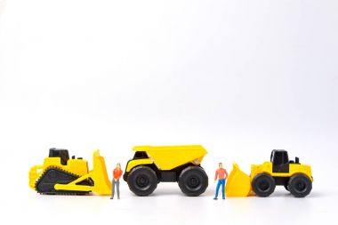 İnşaat kavramı altında grup insan oyuncak ve ağır du ile