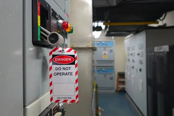 Red, white Lock out & Tag out for Lock station,machine - specific or switch gear roomd evices and safety first point, Cyber security or safety industrial concept.                      