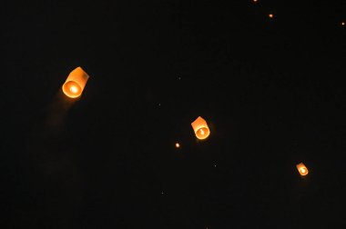 Beautiful Unfounded floating lanthern  on Yi Peng festival and Loy Krathong day. Chiang Mai,Thailand. clipart