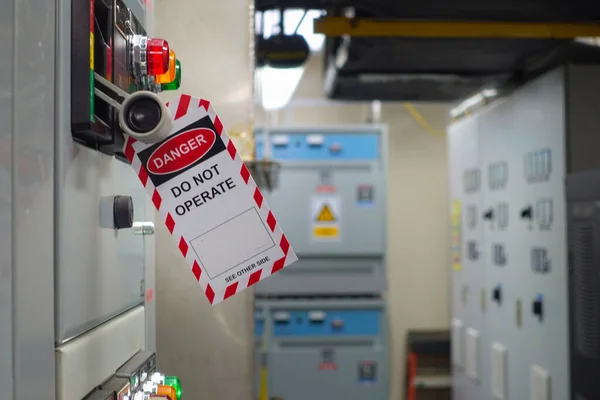 Red, white Lock out & Tag out for Lock station,machine - specific or switch gear roomd evices and safety first point, Cyber security or safety industrial concept.                      