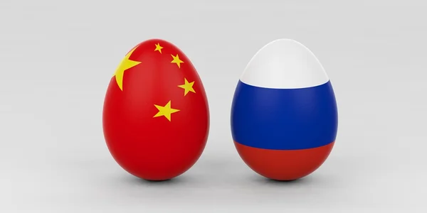 3D рендеринг флагов Китая и России на яйцах — стоковое фото