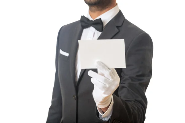Butler holding a blank card — Stock Photo, Image